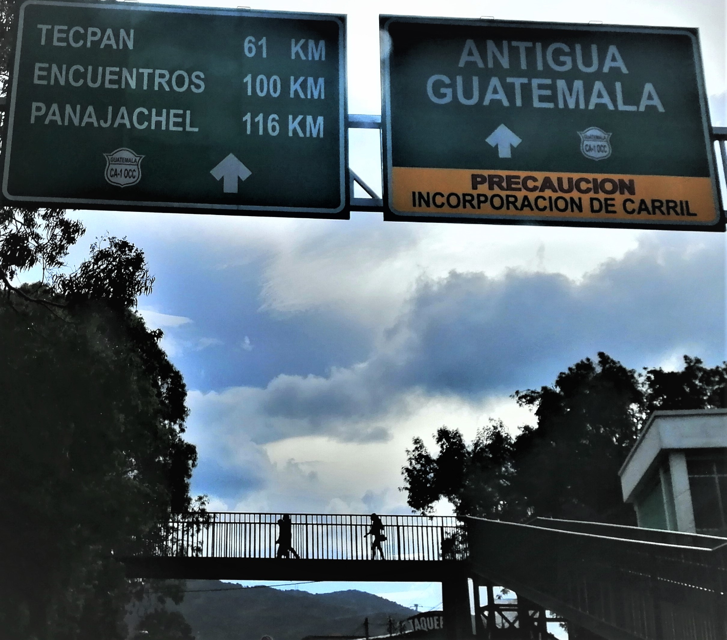Signs on the highway on the way from Guatemala City Airport to Antigua, Guatemala.