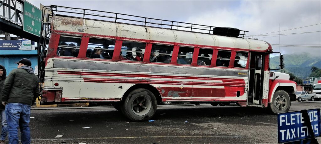 A bus at Los Encuentros in the Guatemalan highlands at 2,582 m (8,471') above sea level.  From the Post: Refurbished Former US School Buses: The Pulse of a Nation.