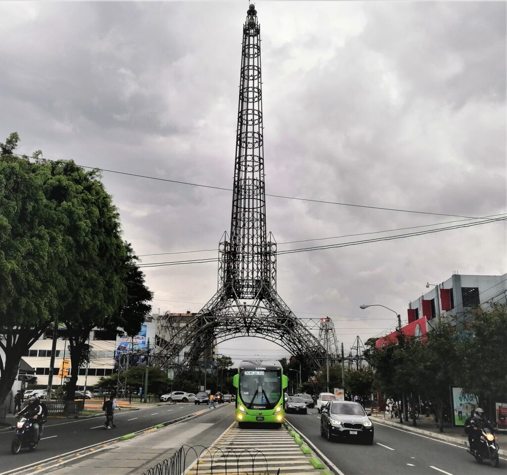 A transmetro city bus in front of Torre del Reformador.  From the post: Guatemala City: A Terrific Travel Destination.