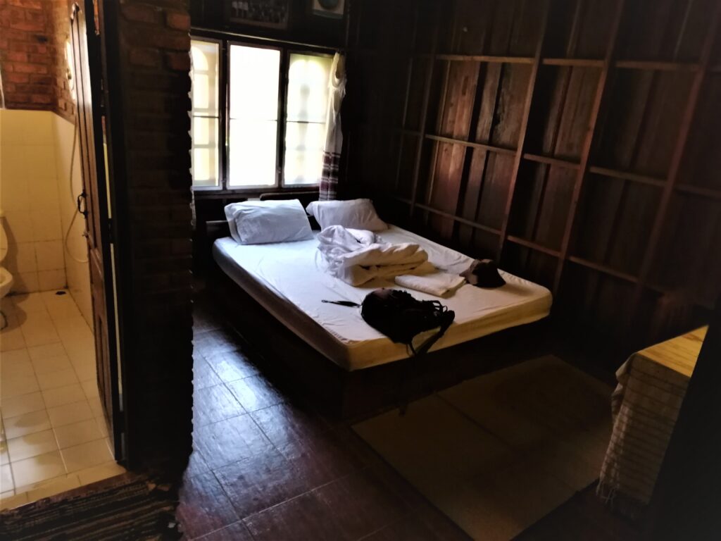 Inside room in traditional wodden Lao design.  It's not sound proof friendly thogh. From the post: Luang Namtha: Why I Spent a Week in a Virtual Ghost Town.