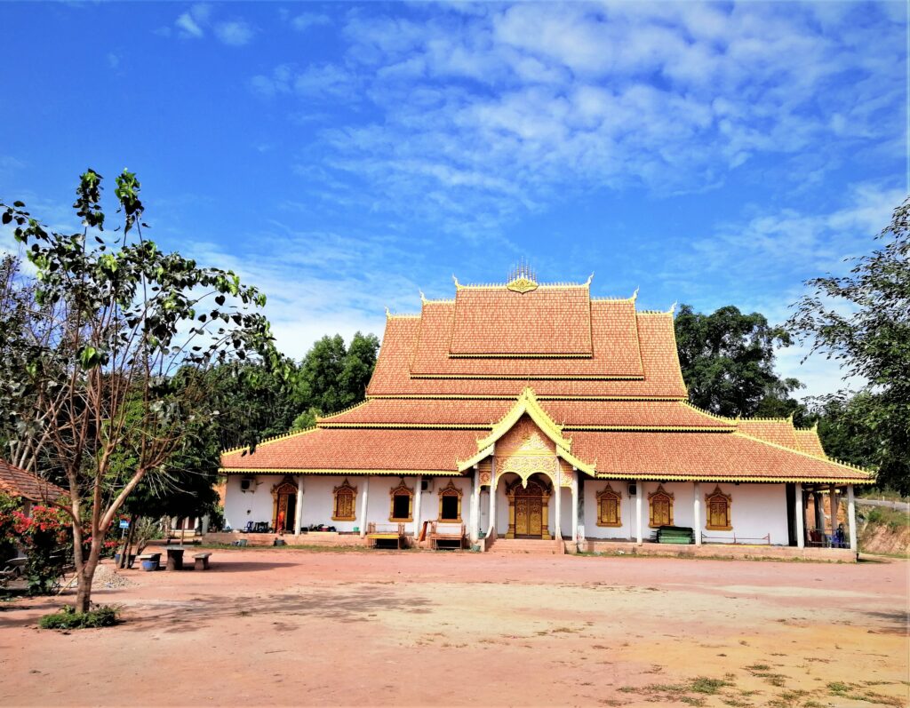 A huge temple with five roofs, six windows and two doors visible in the front of this dazzling design endeavor.