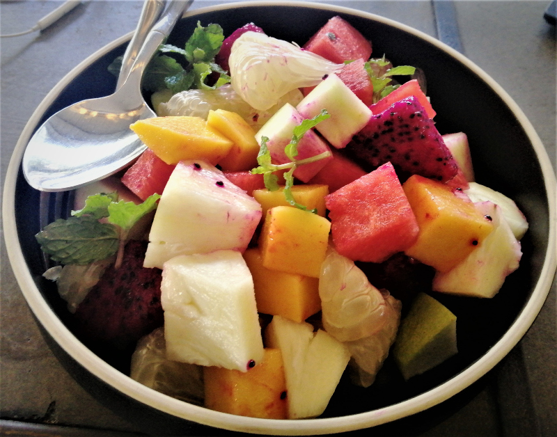 A beautifully colorul tropical fruit salad.  Food is the best medicine.