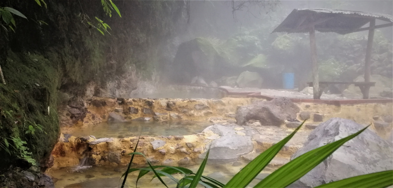 Therapeutic hot springs in nature at Fuentes Geogina in Zunil in the Guatamalan highlands.  