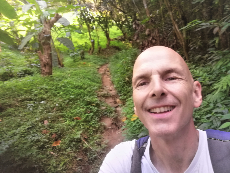 Implementing intentions for wellness selfie on a path in the very small mountain town of Minca, in Magdalena, Colombia.