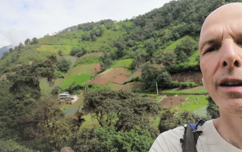 Selfie with beautful mountainous greenery in rural Zunil, Quezaltenango, Guatemala