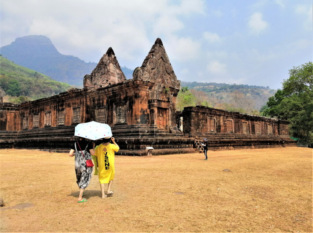 Regional tourists admire 11th century ruins at Vat Phu, in Chmapasak, southern Laos. In Post: Khmer Hindu Time Travel at the Ruins of Vat Phu.