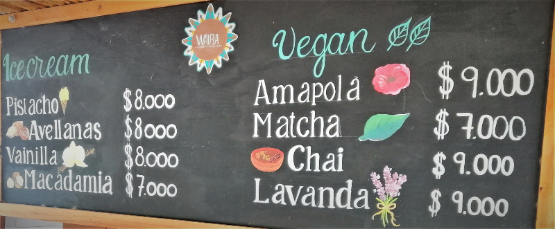 Survival Spanish in seven days. Sign outside Waira Café where they serve deliciously fresh organic and vegan ice cream in Minca, Magdalena, Colombia