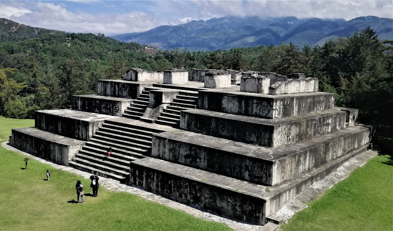 A pyramid style ruin overlooking mountains at Zaculeu, Huehuetenango, Guatemala