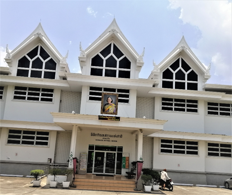 Outside in front of the white, two-storey museum. In post: Visiting The Khon Kaen National Museum.