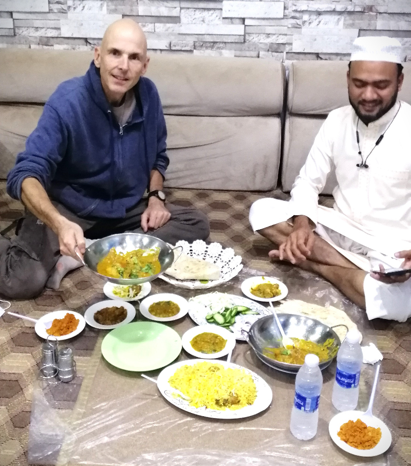 Me and my Bangali friend  on the floor at a restaurant in Hafr al-Batin, Saudi Arabia.