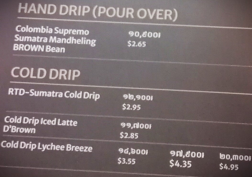 Pour over, hand drip and cold drip coffee optons and prices listed inside Brown Coffee, Siem Reap, Cambodia.